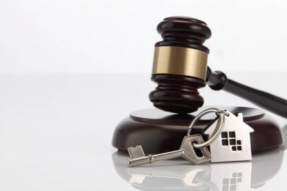 Gavel,Wooden,And,House,For,Home,Buying,Or,Selling,Of real estate attorney