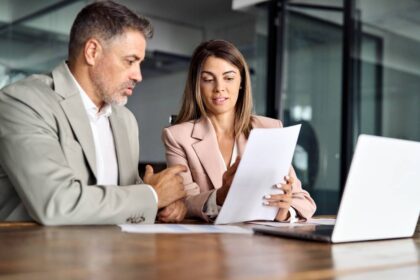 Business,Woman,Lawyer,Manager,Holding,Legal,Documents,Consulting,Mature,Older HOA Lawyer Santa Clara County